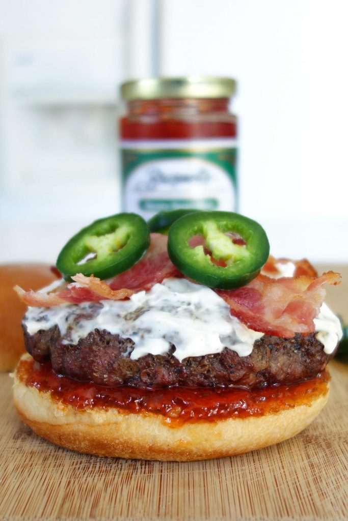 Jalapeno Burger with Cream Cheese, Bacon, and Jalapeno Jelly. This burger melts in your mouth with a kick of spice!