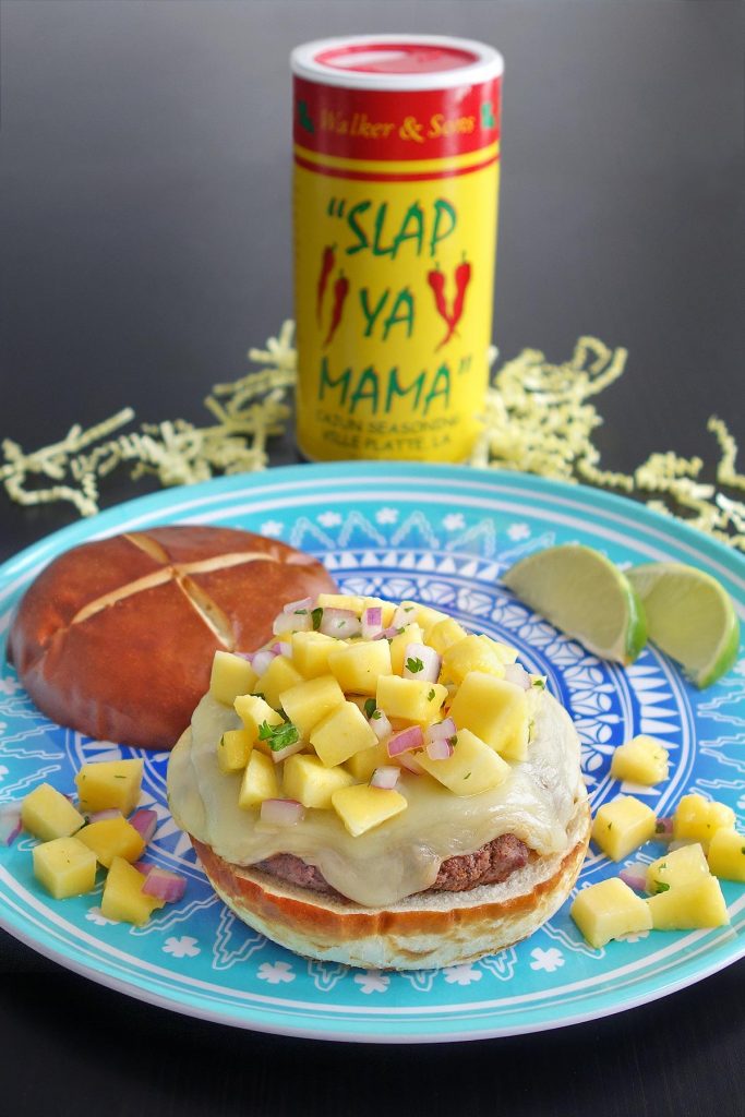 The Islander Burger combines sweet mango salsa and spicy cajun seasoning.