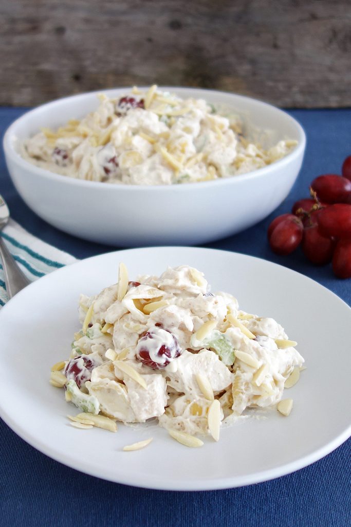 This chicken salad with grapes makes an awesome side dish or main meal. It's really simple to make with cubed chicken, pasta, grapes, celery and a whip & mayo topping. Great for sharing or potlucks!