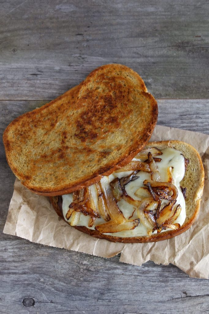 The patty melt is a traditional cheeseburger with caramelized onions on sliced rye bread that's been enjoyed since the 40's. Enjoy this burger recipe!